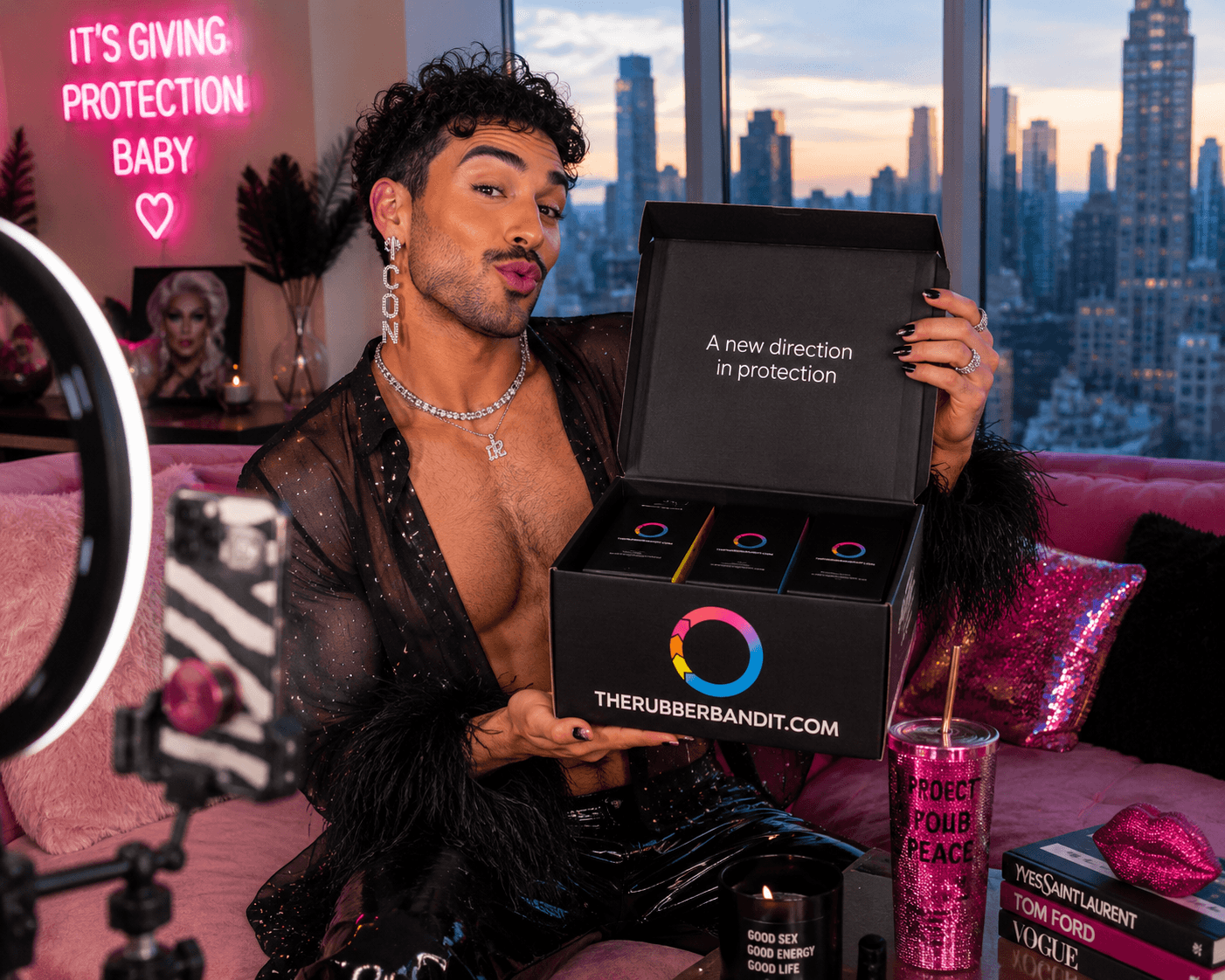 Creator unboxing a Rubber Bandit box in a New York apartment